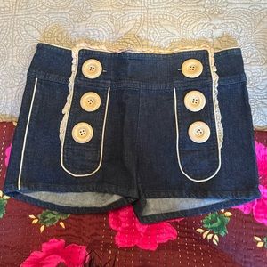 Manoush Jean Shorts with Large Beige Buttons and Ruffle Trim